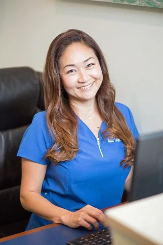 Award winning Honolulu Best Dentist Dr Wade Takenishi's Front Office - Junko
