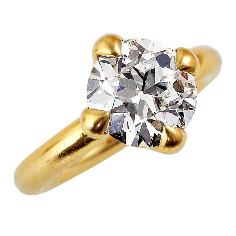4+ CT. ROUND BRILLIANT AND GOLD RING, BY JAR PARIS