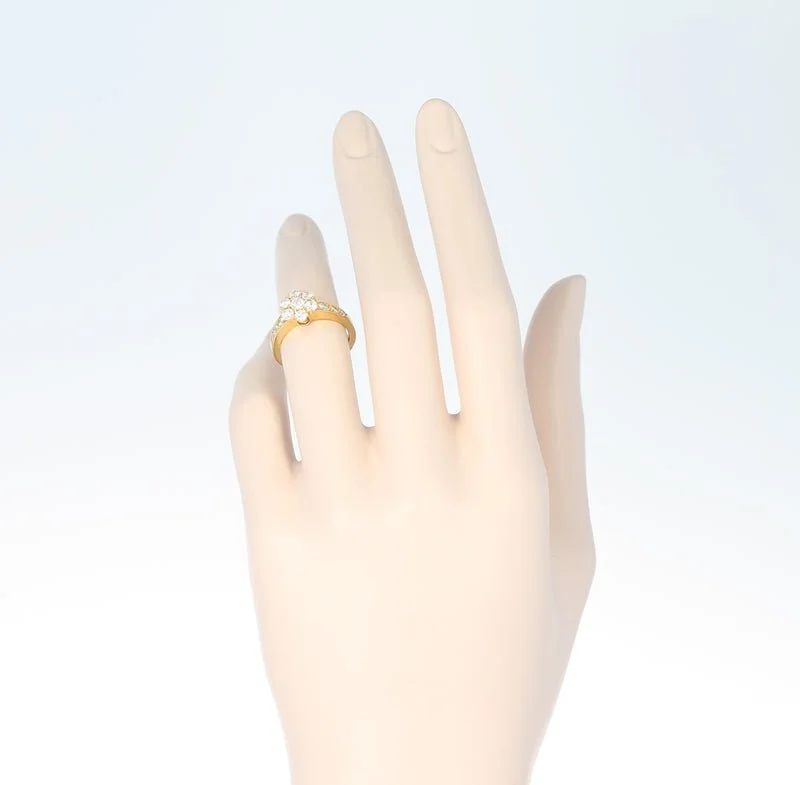 VanCleef_Arpels1.25CaratDiamondYellowGoldOneRowFleuretteRing6_800x.jpg