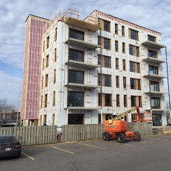 This six-story Polycrete building went up one floor per week.