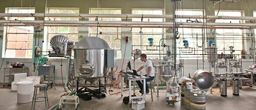This is Joe Hortnagi, an Oregon State University mechanical engineering graduate student, who is in charge of fabricating and testing this barley malting machine.