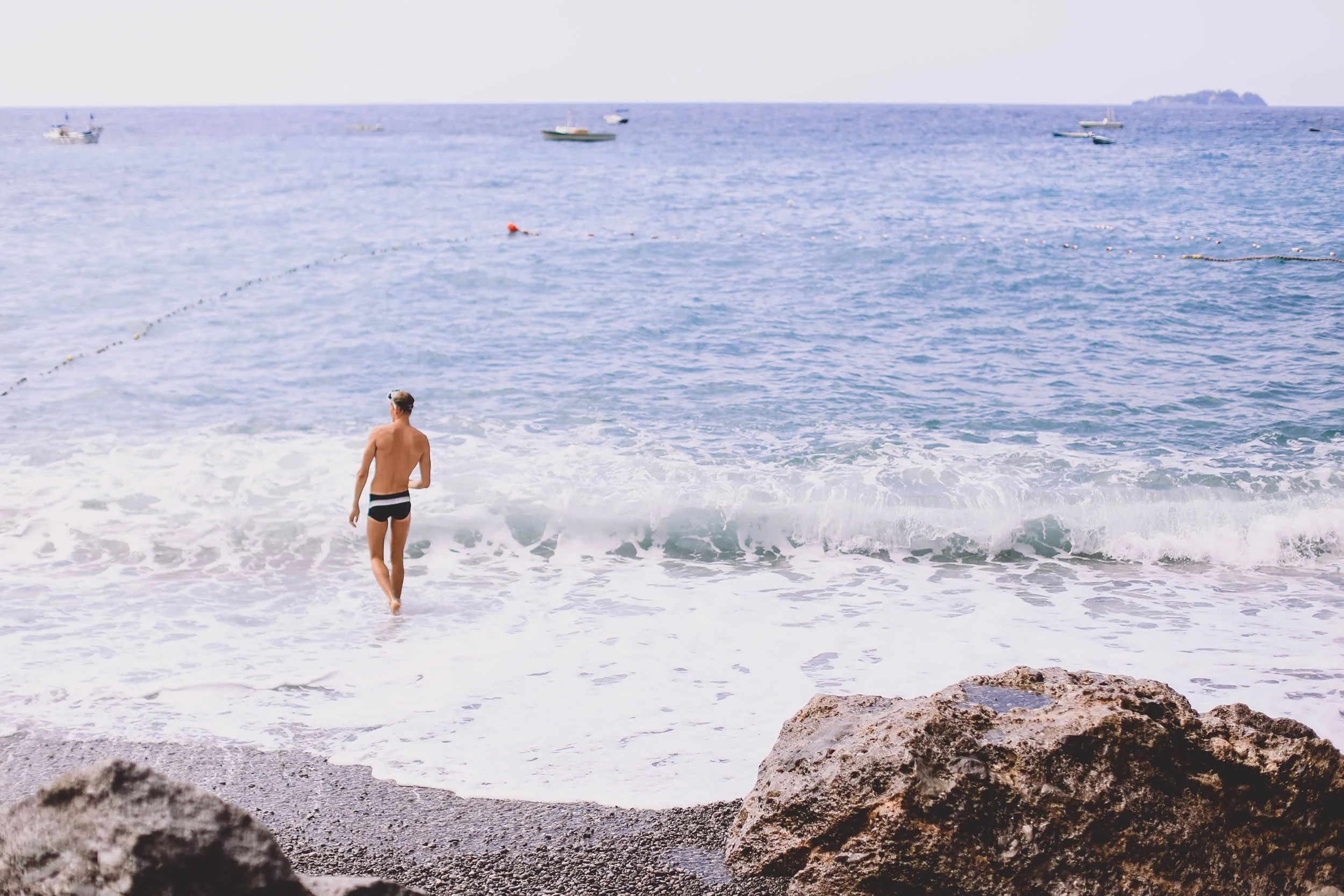 Da Adolfo Beach - Alex going for a swim
