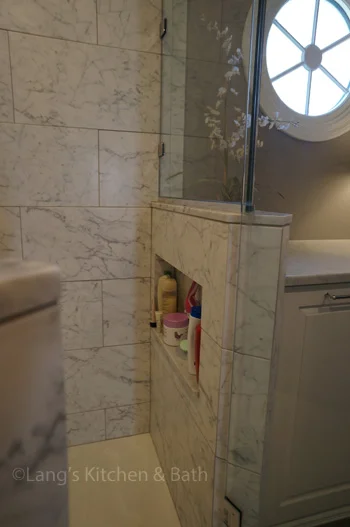 Bathroom design in Yardley, PA with built-in storage niche in shower