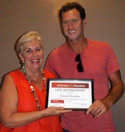 Damien recieveing his life membership at the Noosa Arts Theatre.