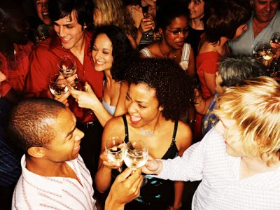Drinking a glass of water in between alcoholic drinks can help keep you from drinking too much at holiday parties