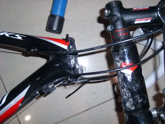 A fake Specialized Tarmac with the head tube sheared off.