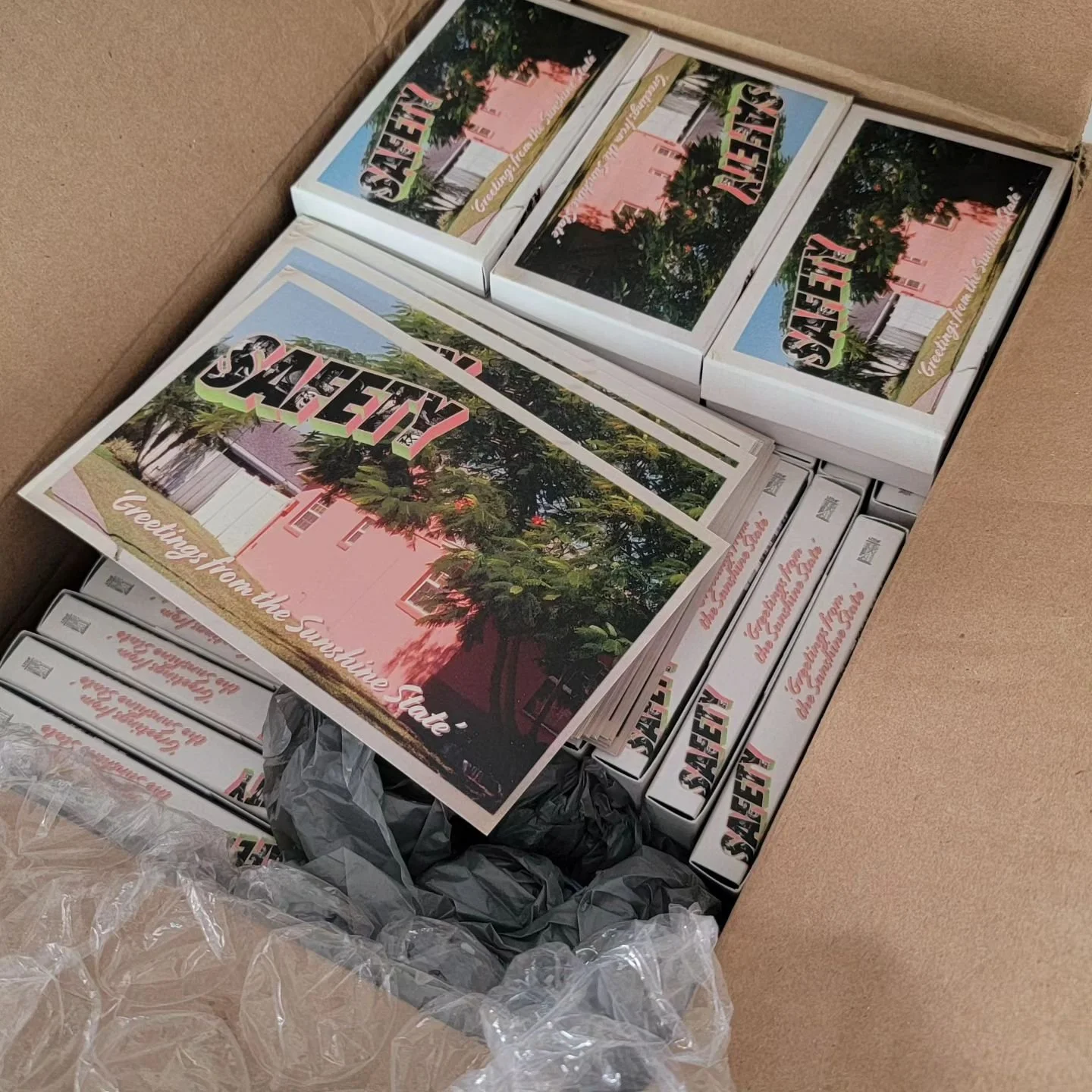 Stoked for this package of postcards and cassette tapes from our 2021 release 'Greetings from the Sunshine State.' Maybe, just maybe, you'll see these in a town near you soon...