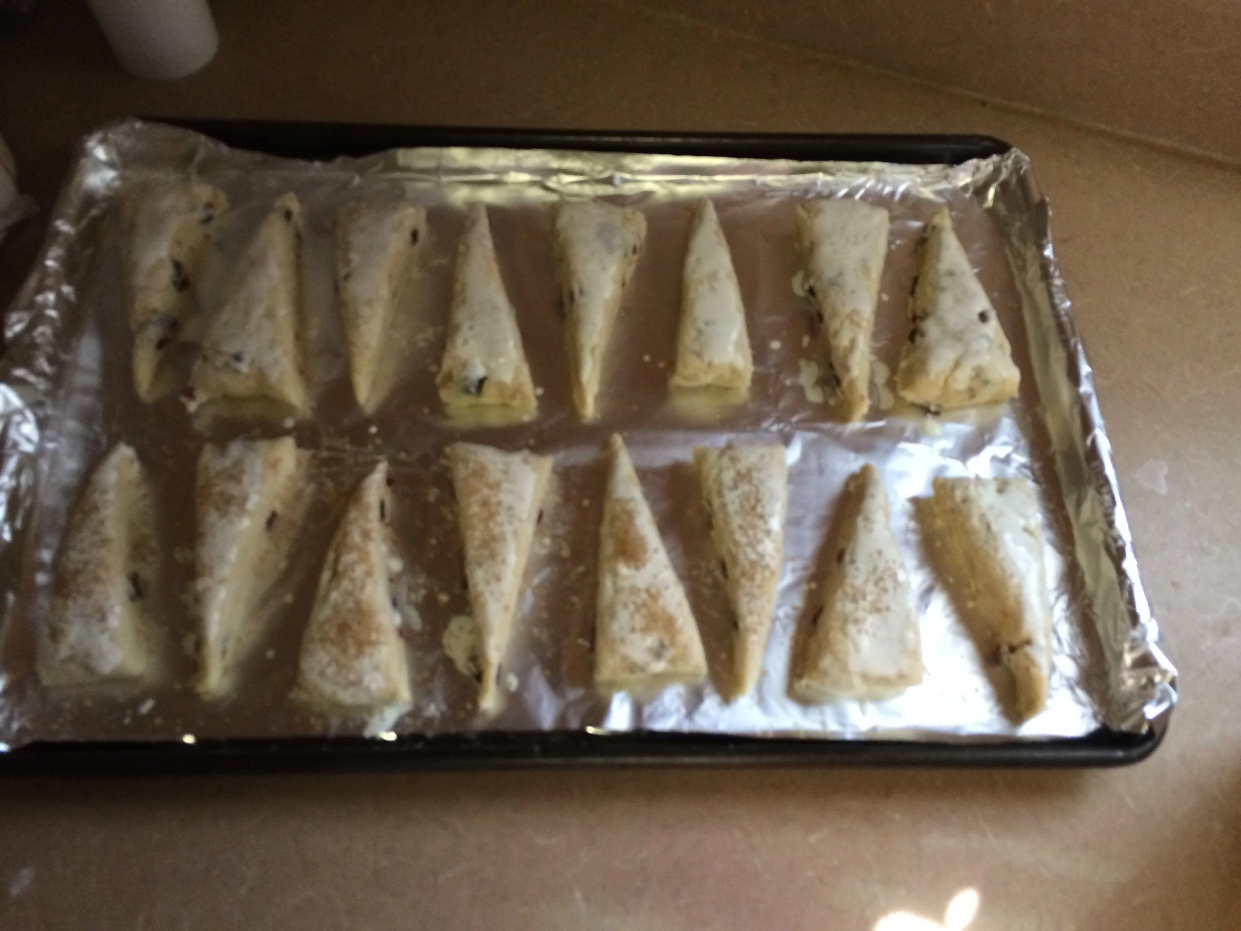 Brushed with milk or cream then dusted generously with turbinado (raw) sugar