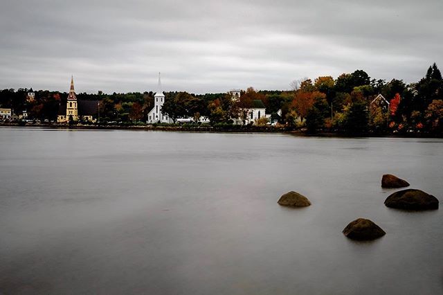 Three churches, Mahone Bay, Nova Scotia. I would have liked to get tighter but I like the foreground rocks and the fall colours. #mahonebay #novascotia #longexposure #fall #autumn #fujifilm #fujifilmxt1