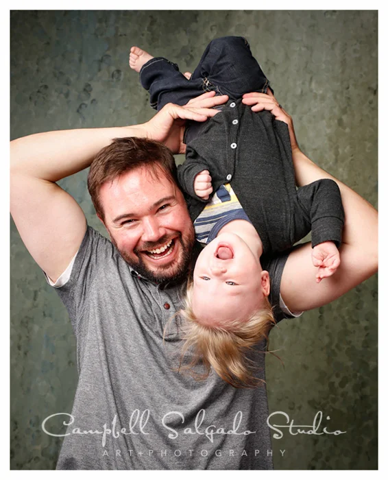 Baby photographers at Campbell Salgado Studio in Portland, Oregon capture a dad and his baby boy.