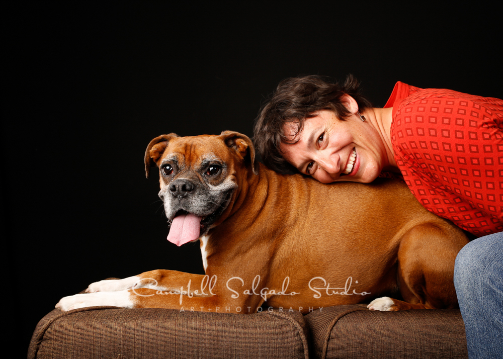  Portrait of woman and dog on black background by pet photographers at Campbell Salgado Studio, Portland, Oregon 