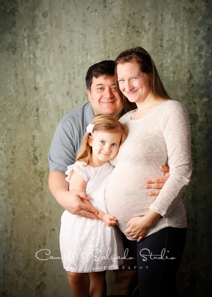 Portrait of family on rain dance background by maternity photographers at Campbell Salgado Studio, Portland, Oregon.