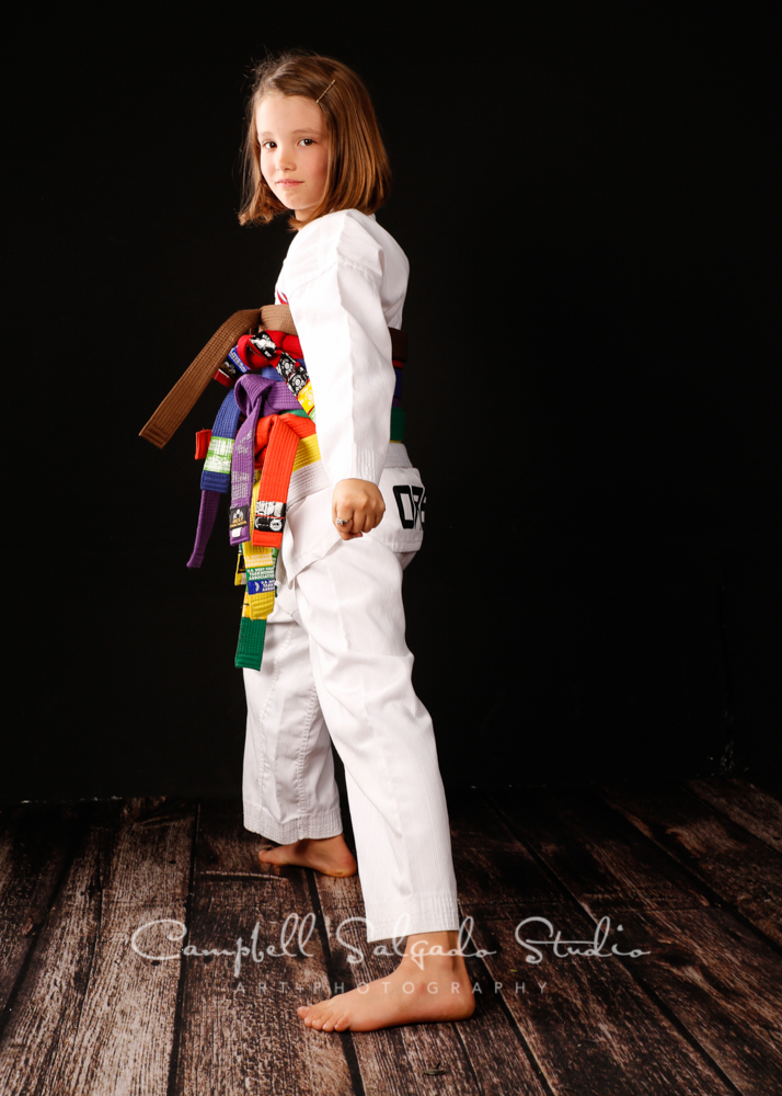  Portrait of girl in Tai Kwon Do gear on black background&nbsp;by child photographers at Campbell Salgado Studio, Portland, Oregon. 