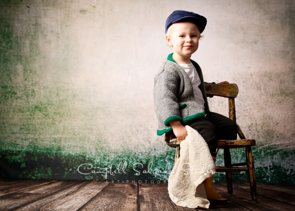  Portrait of boy on abandoned concrete background&nbsp;by child photographers at Campbell Salgado Studio, Portland, Oregon. 