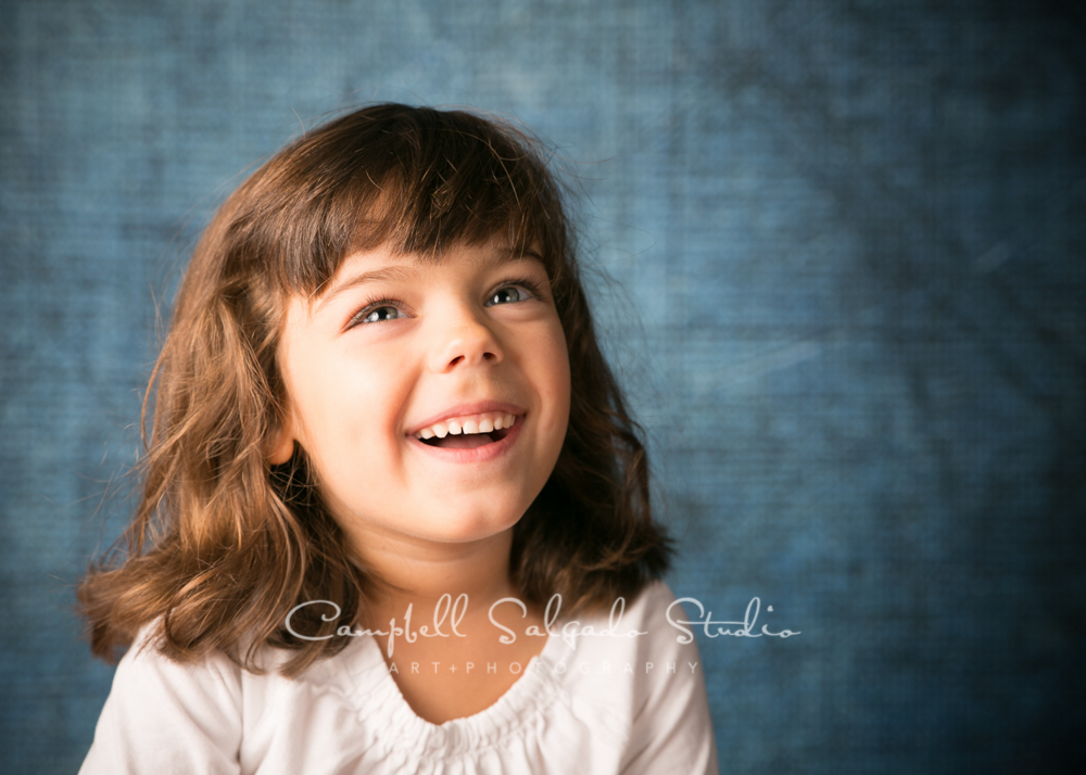  Portrait of girl on denim background&nbsp;by child photographers at Campbell Salgado Studio, Portland, Oregon. 