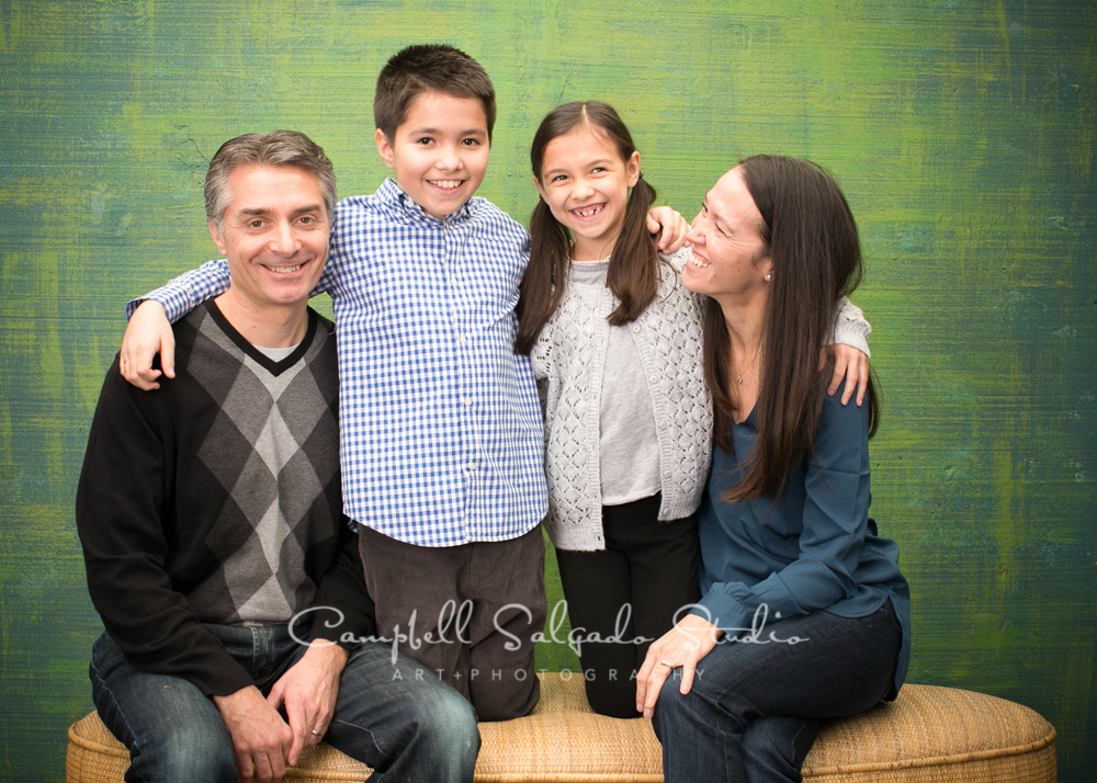  Portrait of family on blue green weave background&nbsp;by family photographers at Campbell Salgado Studio, Portland, Oregon. 