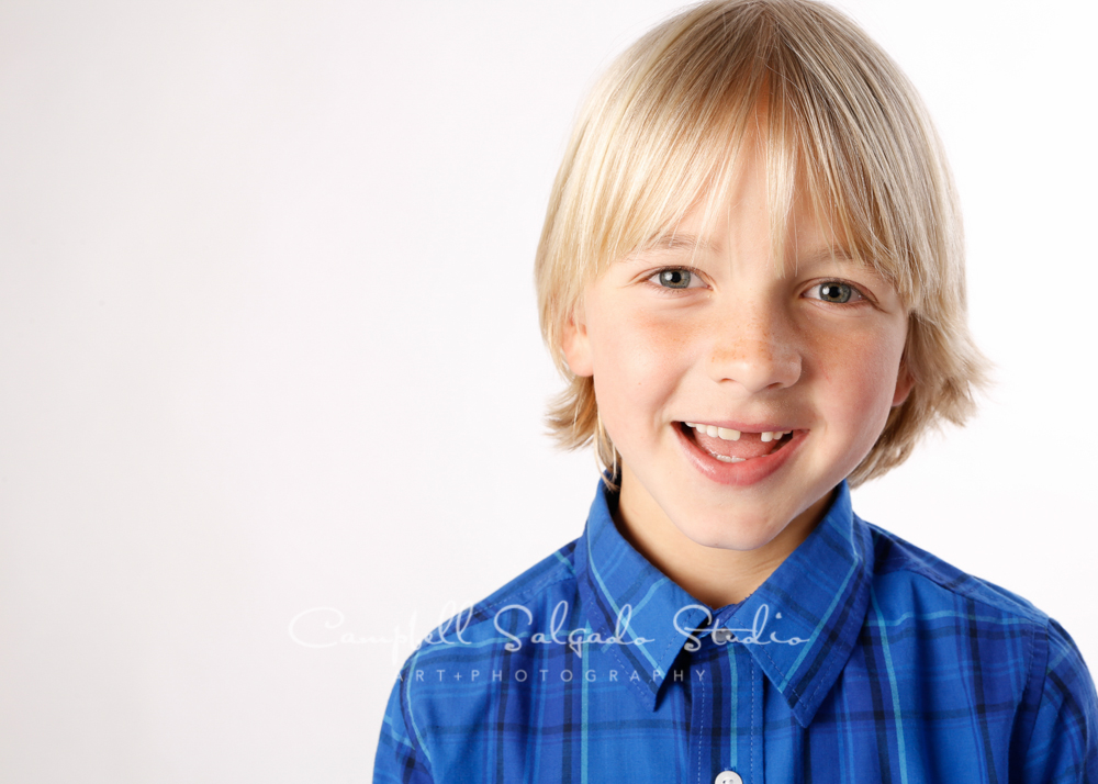  Portrait of child on white background&nbsp;by child photographers at Campbell Salgado Studio, Portland, Oregon. 