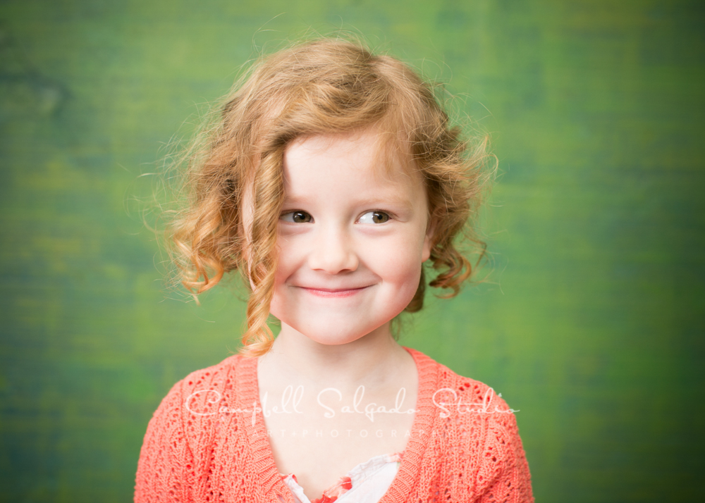  Portrait of girl on blue green weave background&nbsp;by child photographers at Campbell Salgado Studio, Portland, Oregon. 