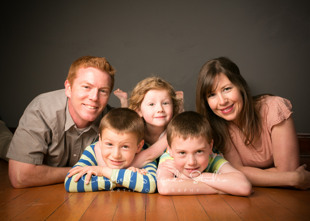  Portrait of family on grey background&nbsp;by family photographers at Campbell Salgado Studio, Portland, Oregon. 