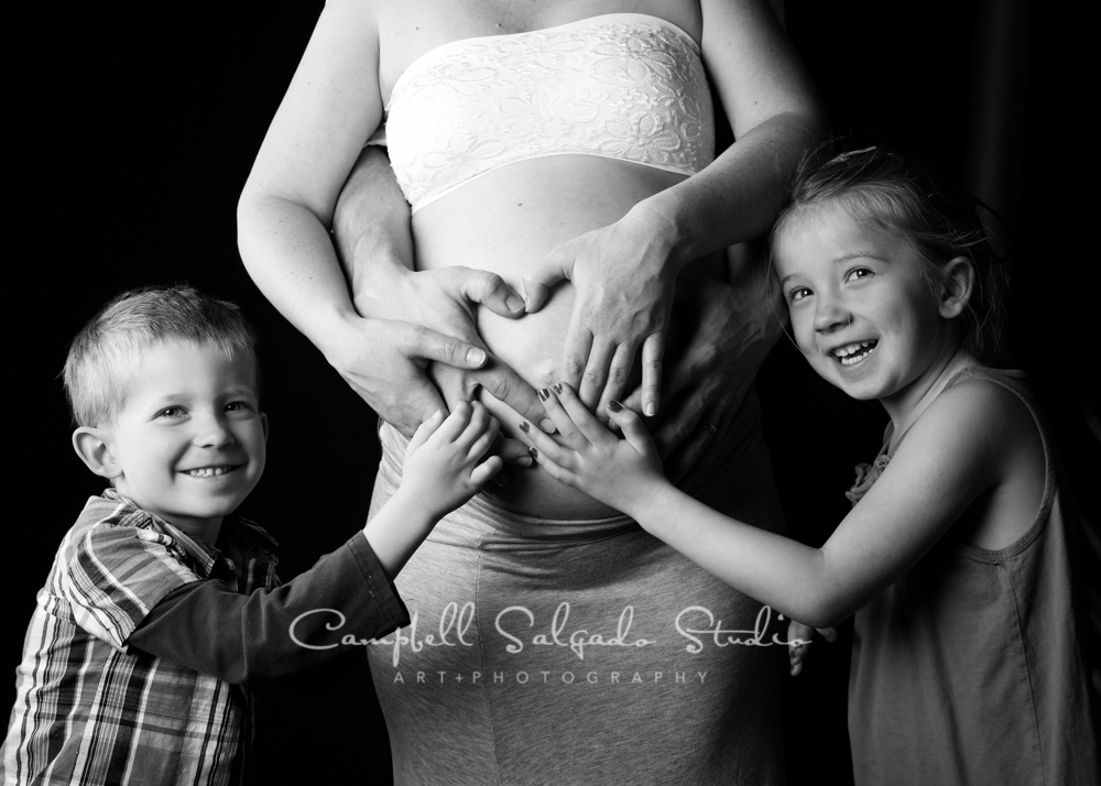  B&amp;W portrait of family and pregnant belly on black background&nbsp;by maternity&nbsp;photographers at Campbell Salgado Studio, Portland, Oregon. 