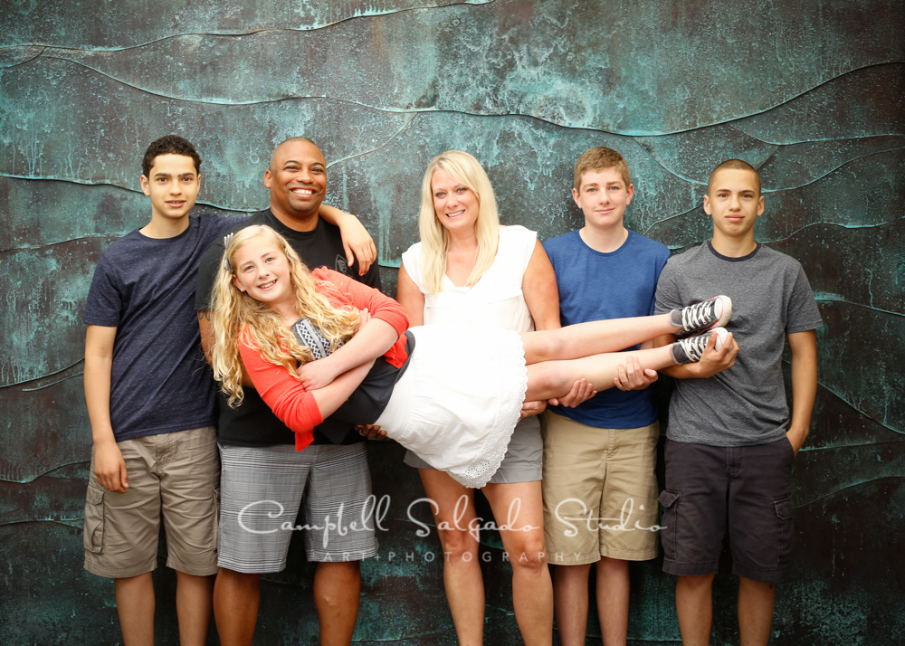  Portrait of family on copper wave background&nbsp;by family photographers at Campbell Salgado Studio, Portland, Oregon. 