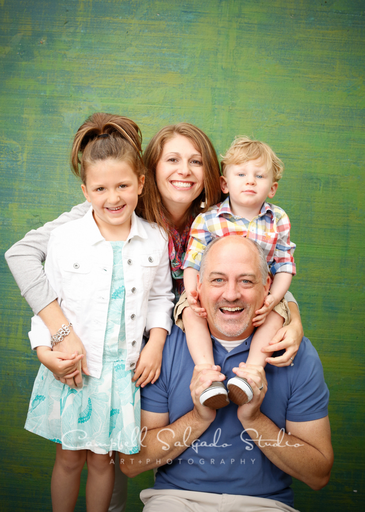  Portrait of family on blue green weave background&nbsp;by family photographers at Campbell Salgado Studio, Portland, Oregon 