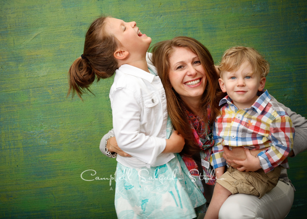  Portrait of family on blue green weave background&nbsp;by family photographers at Campbell Salgado Studio, Portland, Oregon 