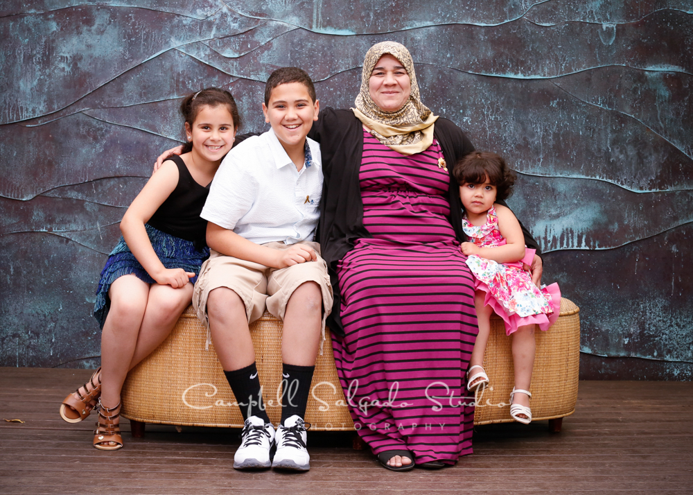  Portrait of family on copper wave&nbsp;background&nbsp;by family photographers at Campbell Salgado Studio, Portland, Oregon. 