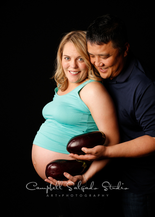  Portrait of expecting couple on black background&nbsp;by maternity&nbsp;photographers at Campbell Salgado Studio, Portland, Oregon. 