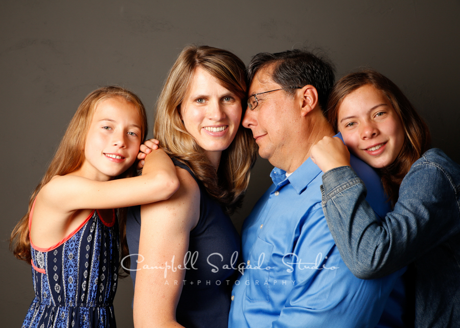  Portrait of family on grey&nbsp;background&nbsp;by family photographers at Campbell Salgado Studio, Portland, Oregon. 