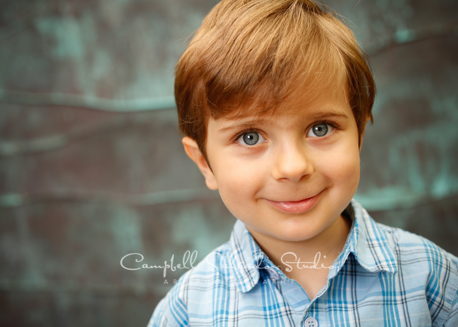  Portrait of boy on copper wave&nbsp;background by family photographers at Campbell Salgado Studio, Portland, Oregon. 