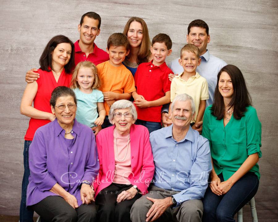  Portrait of multi-generational family&nbsp;on graphite background by family photographers at Campbell Salgado Studio in Portland, Oregon. 