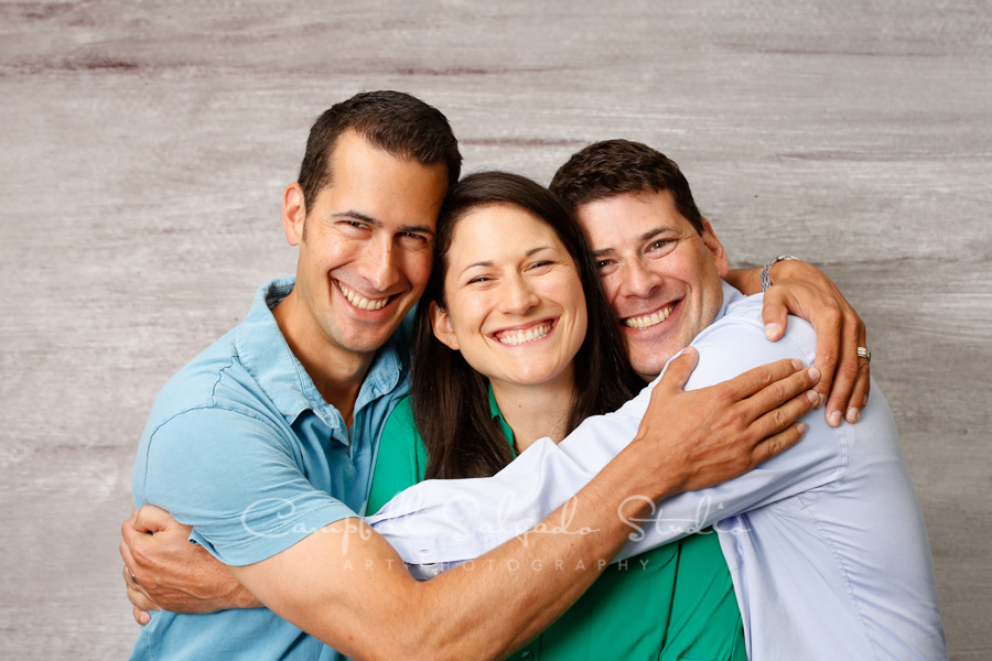  Portrait of siblings on graphite background by family photographers at Campbell Salgado Studio in Portland, Oregon. 