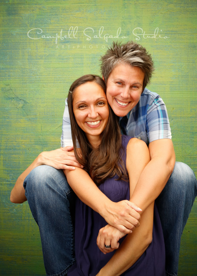  Portrait of couple on blue&nbsp;green weave&nbsp;background by family photographers at Campbell Salgado Studio in Portland, Oregon. 
