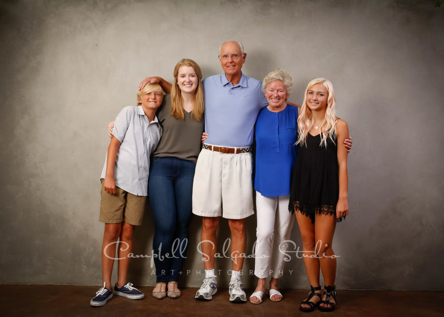  Portrait of multi generational family on modern gray&nbsp;background by family photographers at Campbell Salgado Studio in Portland, Oregon. 