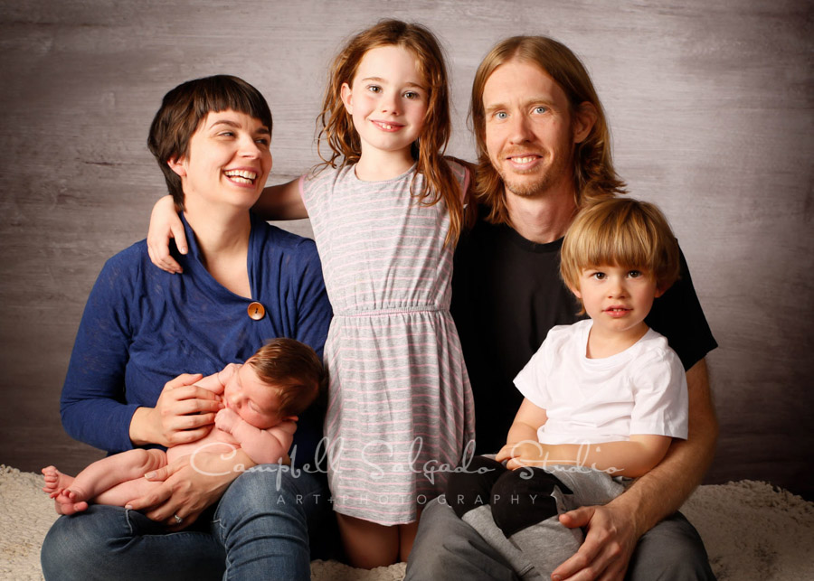  Portrait of family on graphite background by family photographers at Campbell Salgado Studio in Portland, Oregon. 