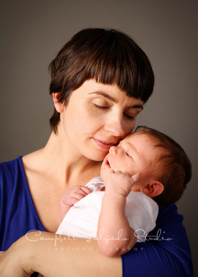  &nbsp;Portrait of mother and newborn on grey background by newborn photographers at Campbell Salgado Studio in Portland, Oregon. 