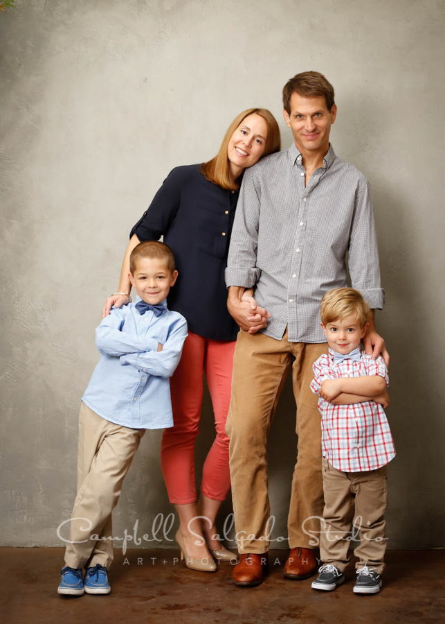  Portrait of family on modern gray background by family photographers at Campbell Salgado Studio in Portland, Oregon. 