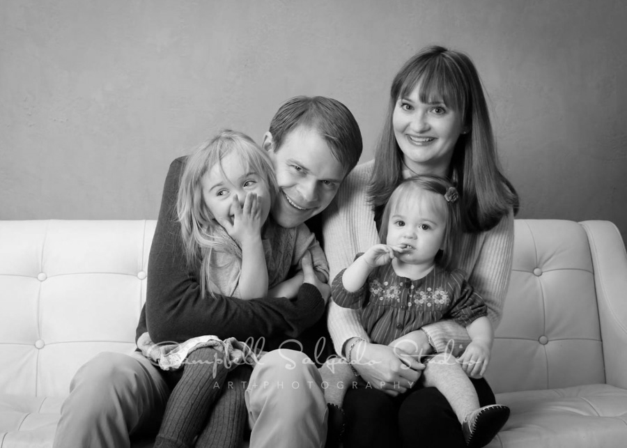  Black and white portrait of family on modern grey background by family photographers at Campbell Salgado Studio in Portland, Oregon. 