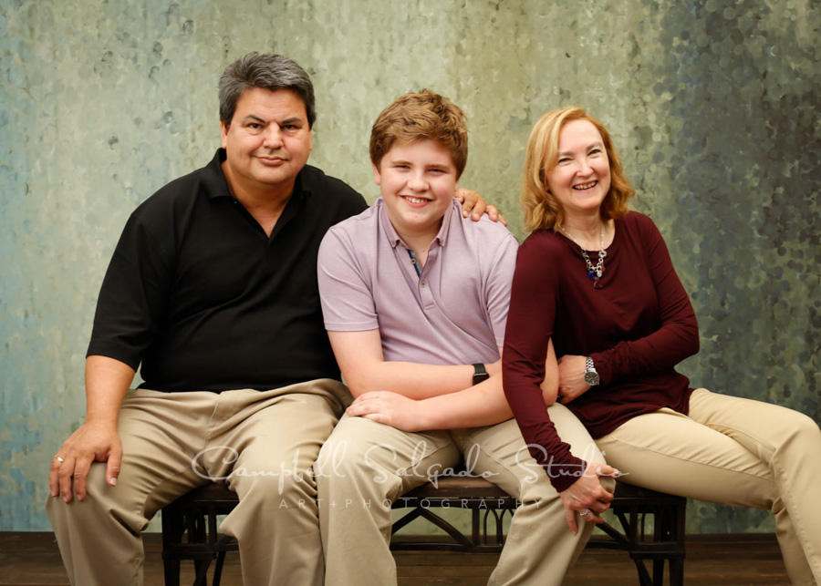  Portrait of family on rain dnace background by family photographers at Campbell Salgado Studio in Portland, Oregon. 