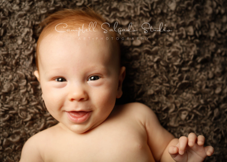  Portrait of baby on blankie background by baby photographers at Campbell Salgado Studio in Portland, Oregon. 