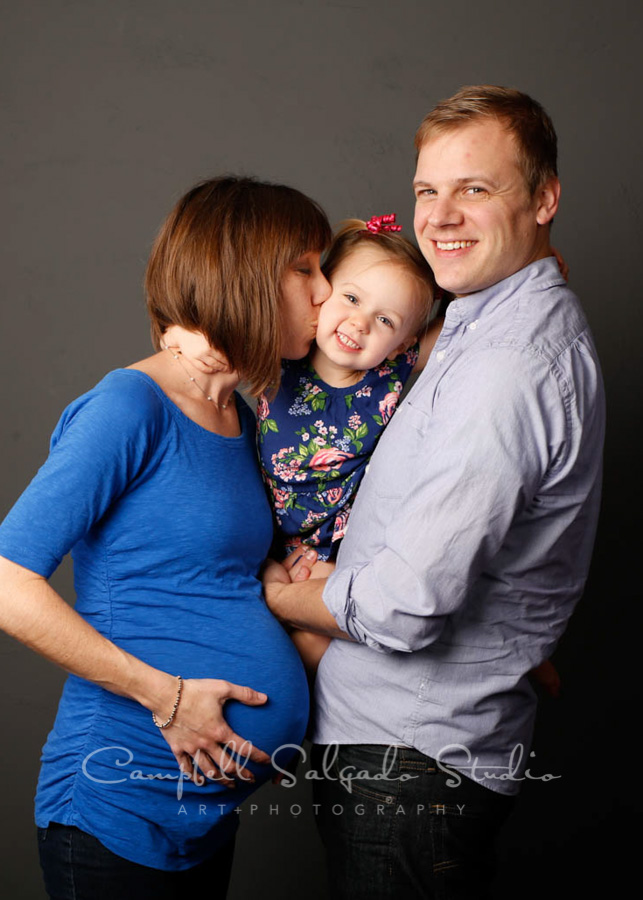  Portrait of family on grey background by maternity photographers at Campbell Salgado Studio in Portland, Oregon. 