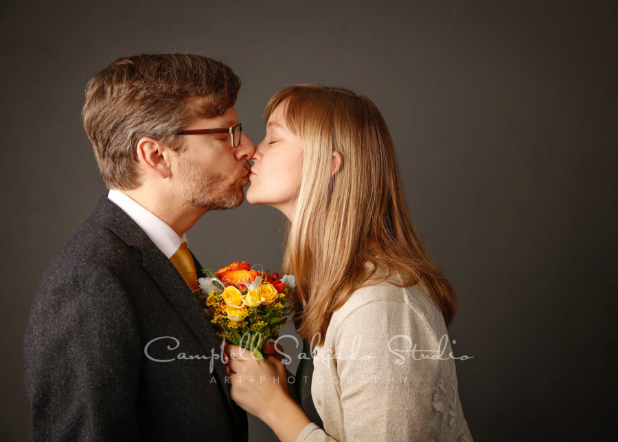  Portrait of couple on gray background by couples photographers at Campbell Salgado Studio in Portland, Oregon. 