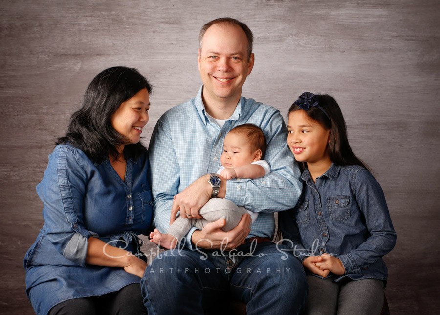  Portrait of family on graphite background by family photographers at Campbell Salgado Studio in Portland, Oregon. 