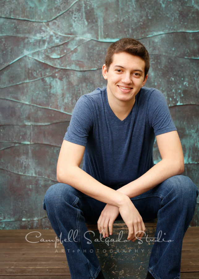  Portrait of teen on copper wave background by family photographers at Campbell Salgado Studio in Portland, Oregon. 