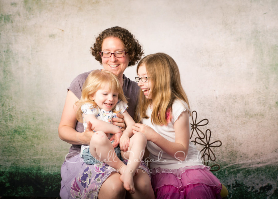  Portrait of mother and daughters on abandoned concrete background by family photographers at Campbell Salgado Studio in Portland, Oregon. 