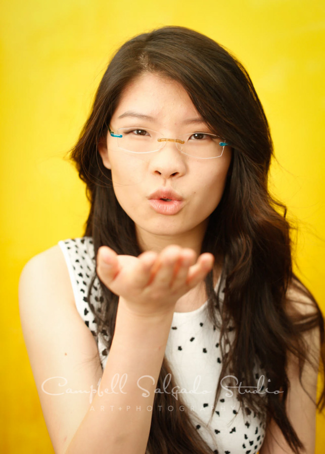  Portrait of teen on liquid sunshine background by teen photographers at Campbell Salgado Studio in Portland, Oregon. 