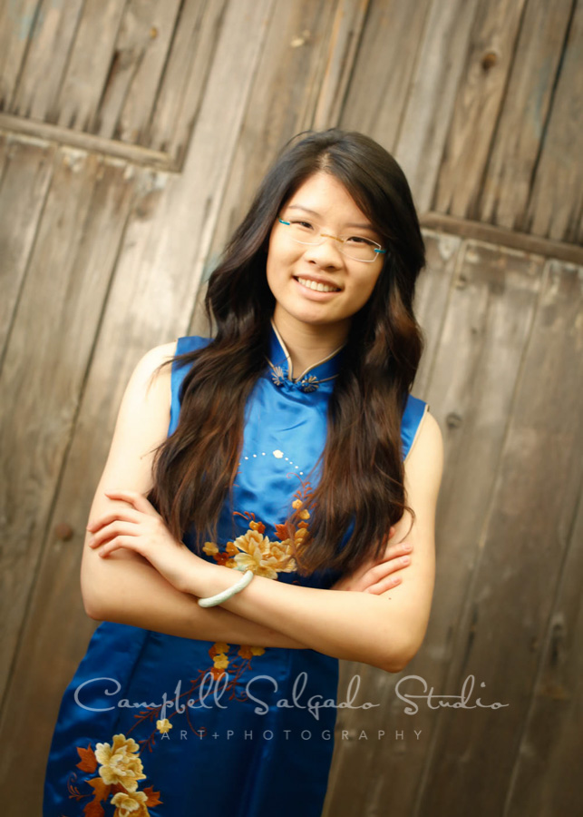  Portrait of teen on barn doors background by teen photographers at Campbell Salgado Studio in Portland, Oregon. 