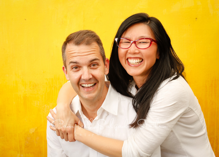  Portrait of couple on liquid sunshine background by family photographers at Campbell Salgado Studio in Portland, Oregon. 