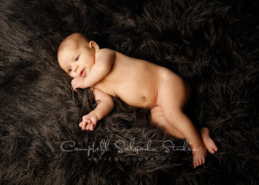  Portrait of baby on blankies background by newborn photographers at Campbell Salgado Studio in Portland, Oregon. 